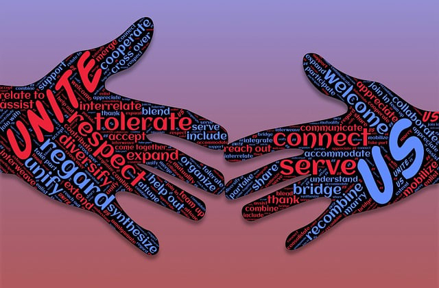 Hands reaching out to each other with words of connection and respect.